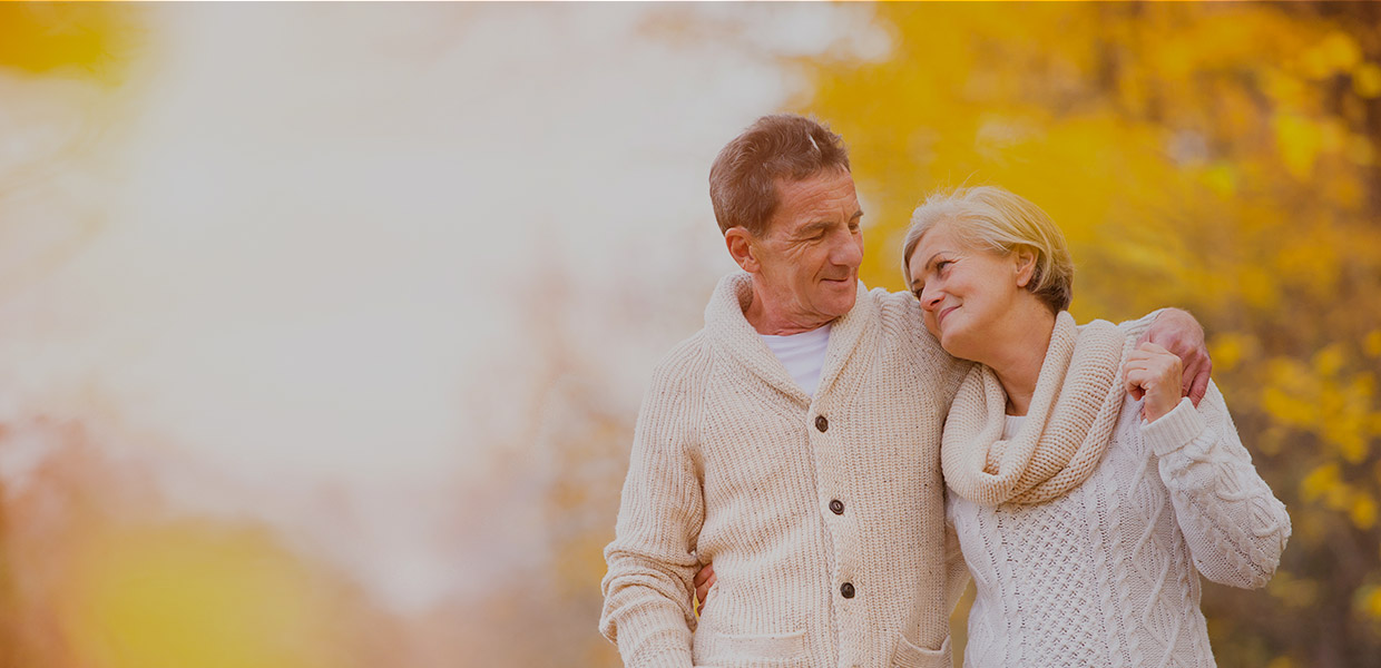 Smiling couple visiting Britten Periodontics in Clearwater, Florida
